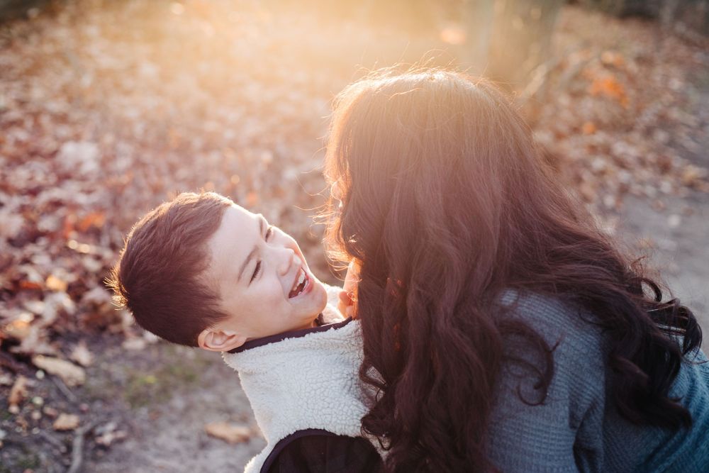 woman and child in golden hour
