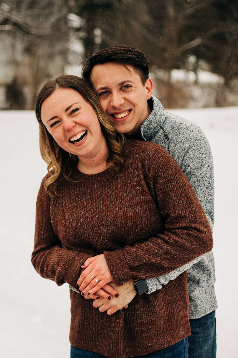 couple smiles in winter
