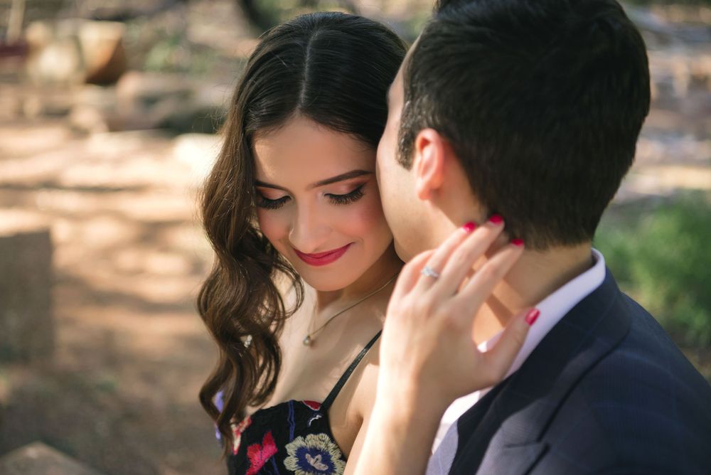 couple cuddling at the engagement session