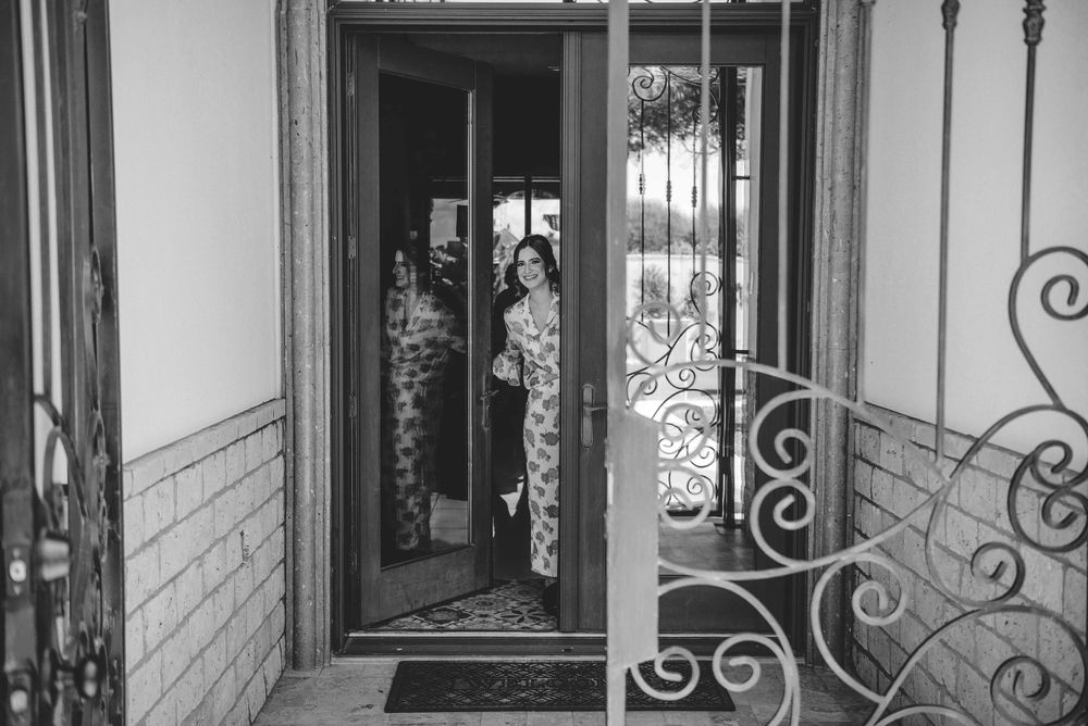 first impression of the bride opening the door