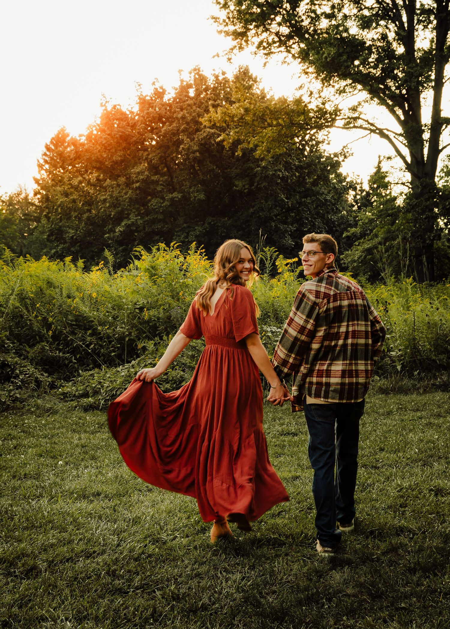 Couple walking away from photographer