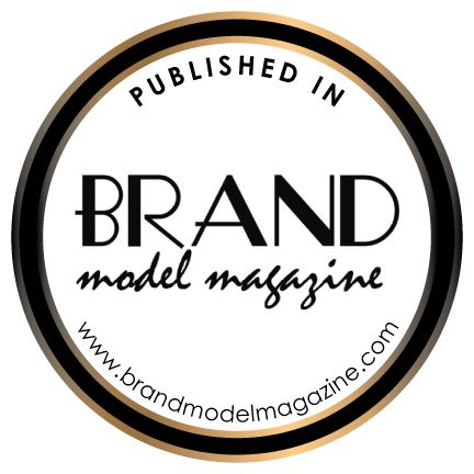 Black and white circular logo for Brand Model Magazine featuring stylized text and website URL.