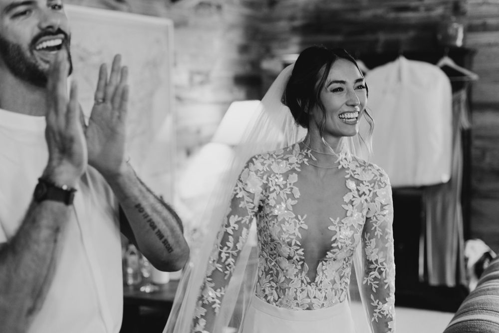 Black and white candid moments during wedding preparations.