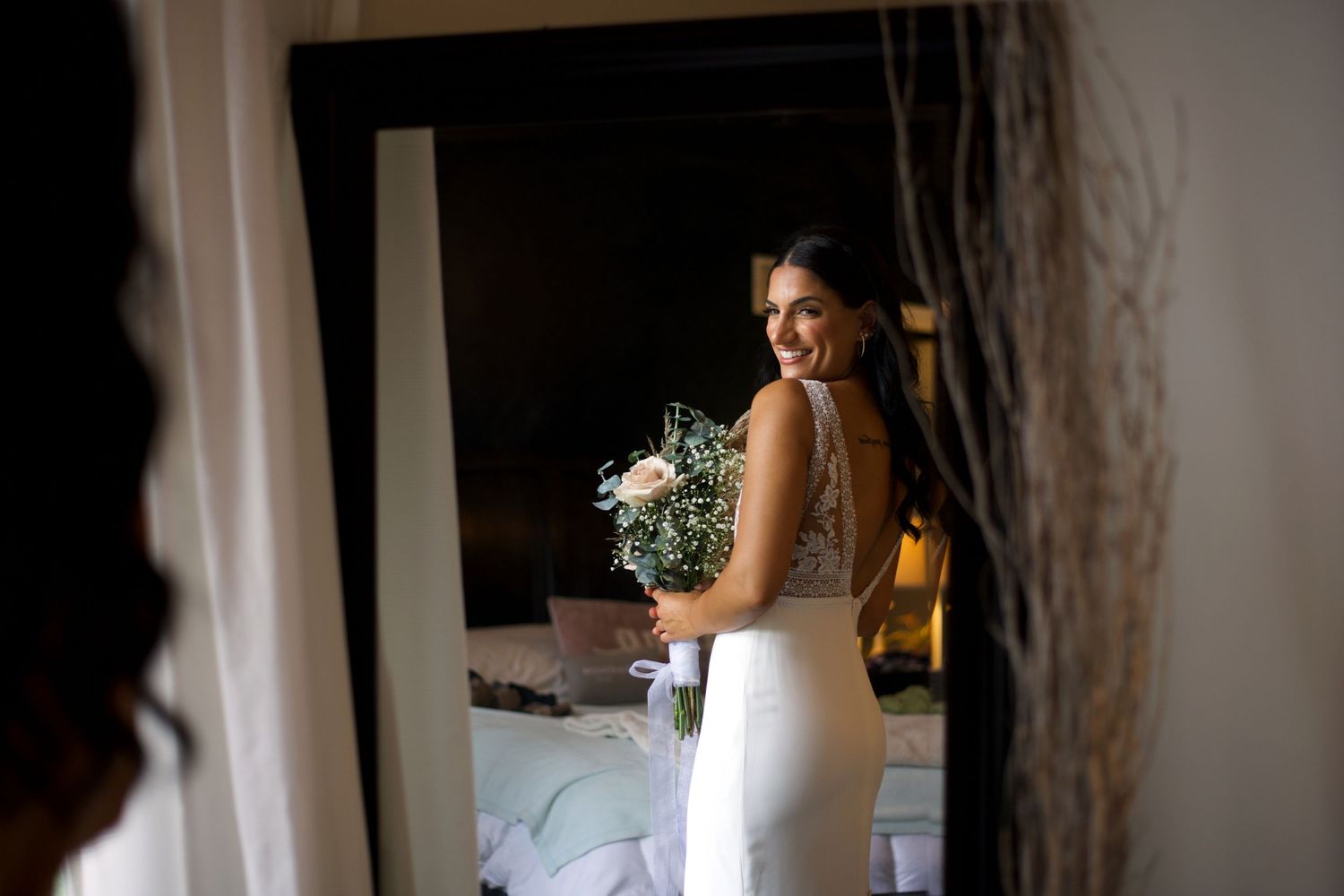 bride, mirror, flowers, bouquet, smiling, excited, makeup, reflection