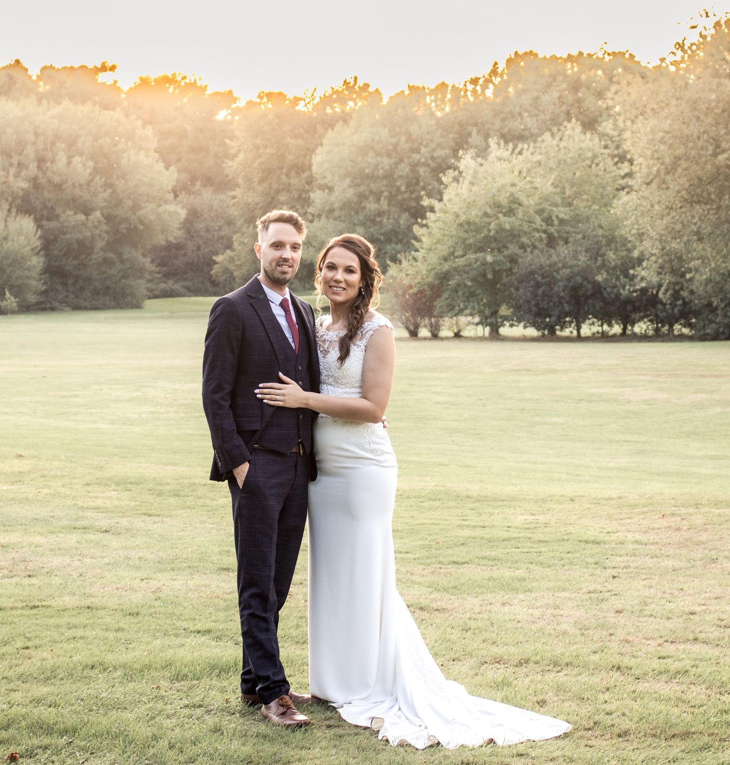 Golden hour wedding photography sequence in an open field with warm sunset lighting.