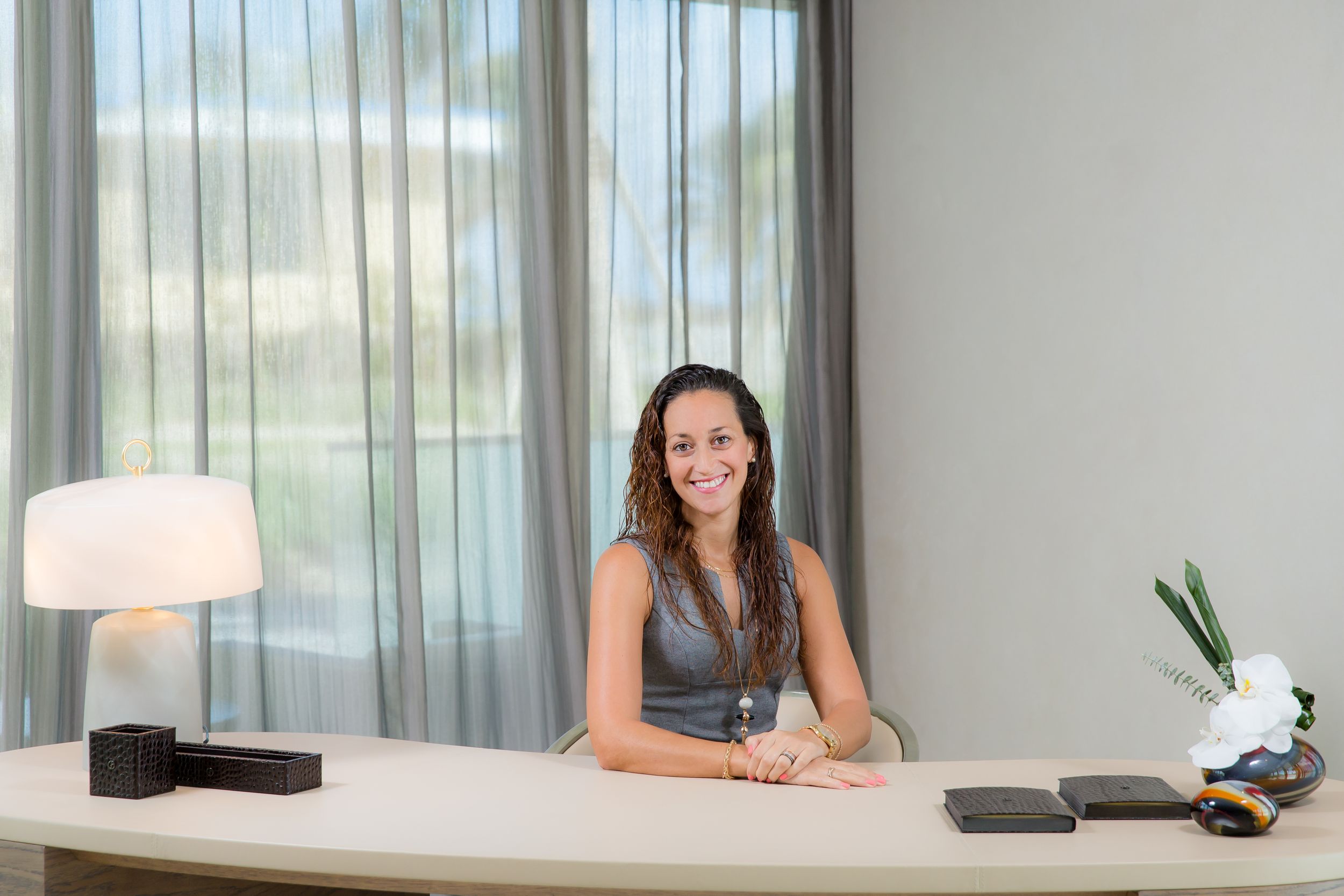 Modern conference room interior with glass windows and office furniture.