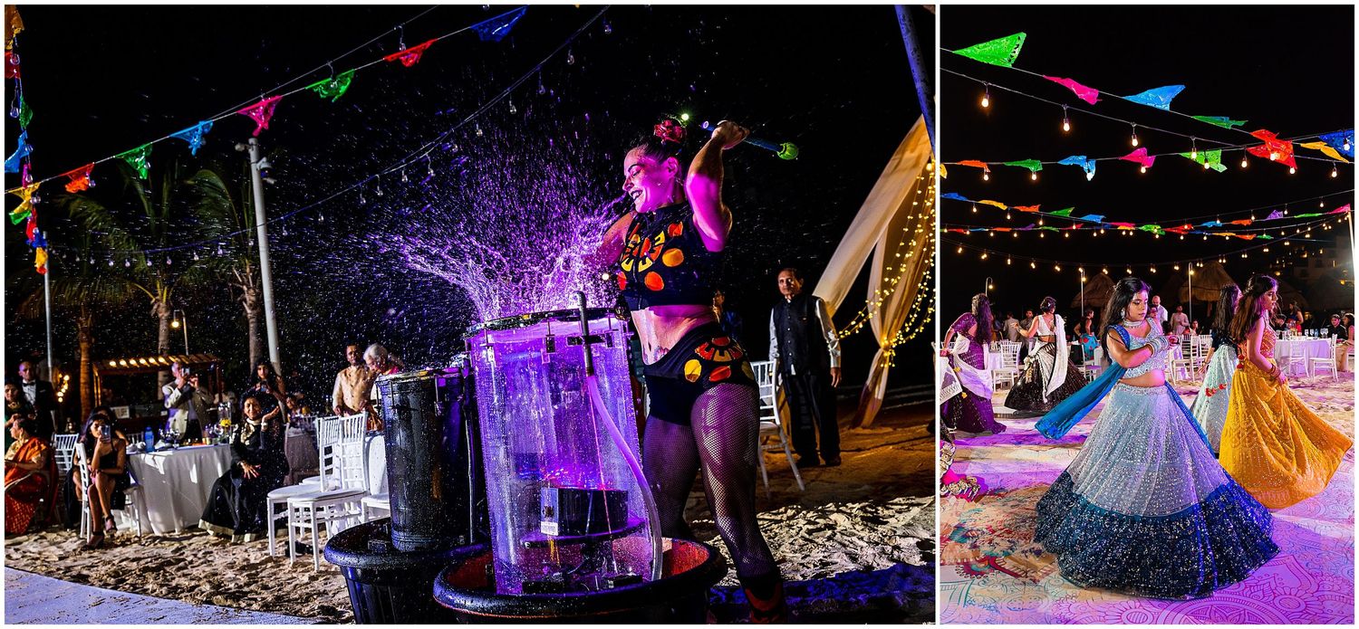 Night beach celebration with colorful lights and performers creating spectacular effects.
