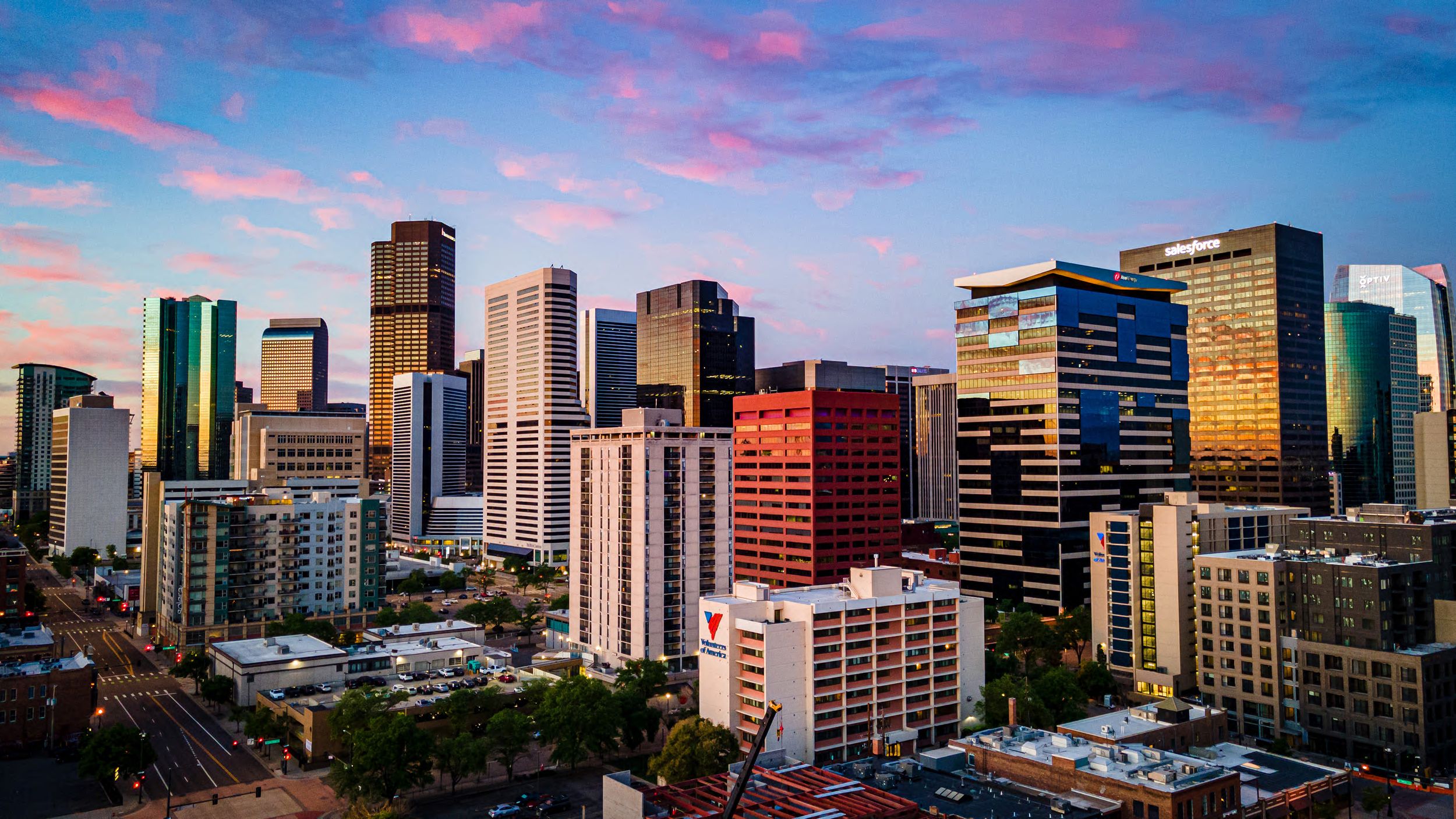 Aerial/drone photo of Downtown Denver at sunrise by Denver Drone, Hospitality, Travel & Tourism photographer Captain Colorado Photography.