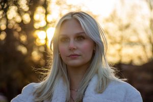 “Senior portrait outdoors during golden hour, by Jamie Macey Photography”