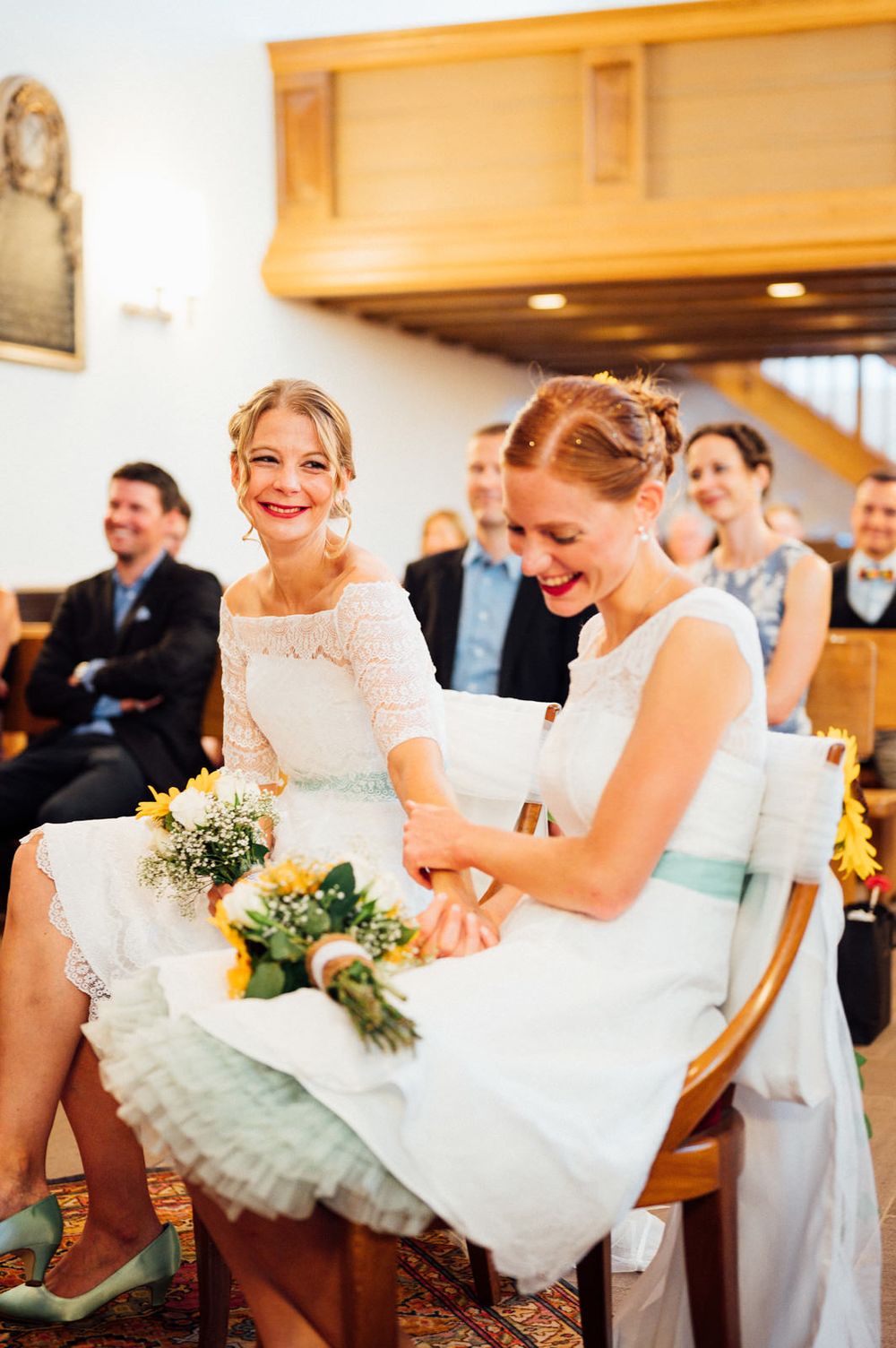 Joyful celebration moment in a traditional church setting.