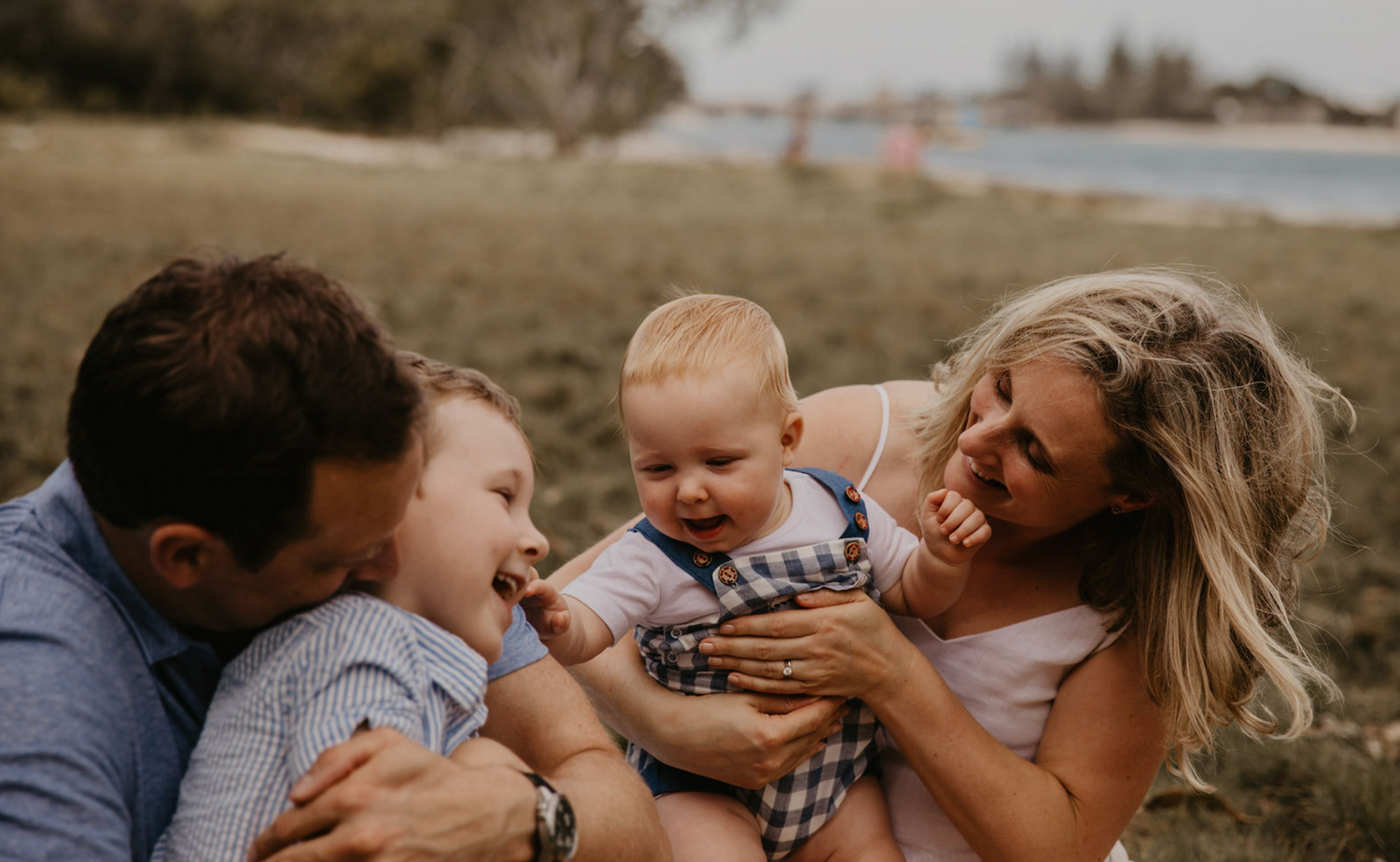 Summer time family portrait on beach in Gold Coast, Queensland.
