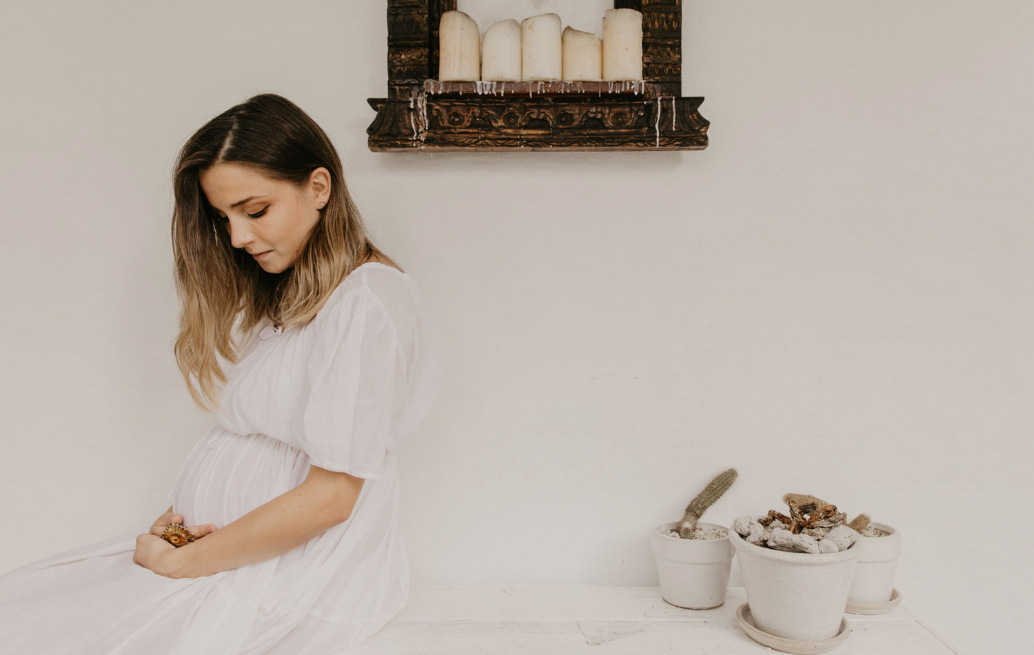 Pregnant woman sitting in chair