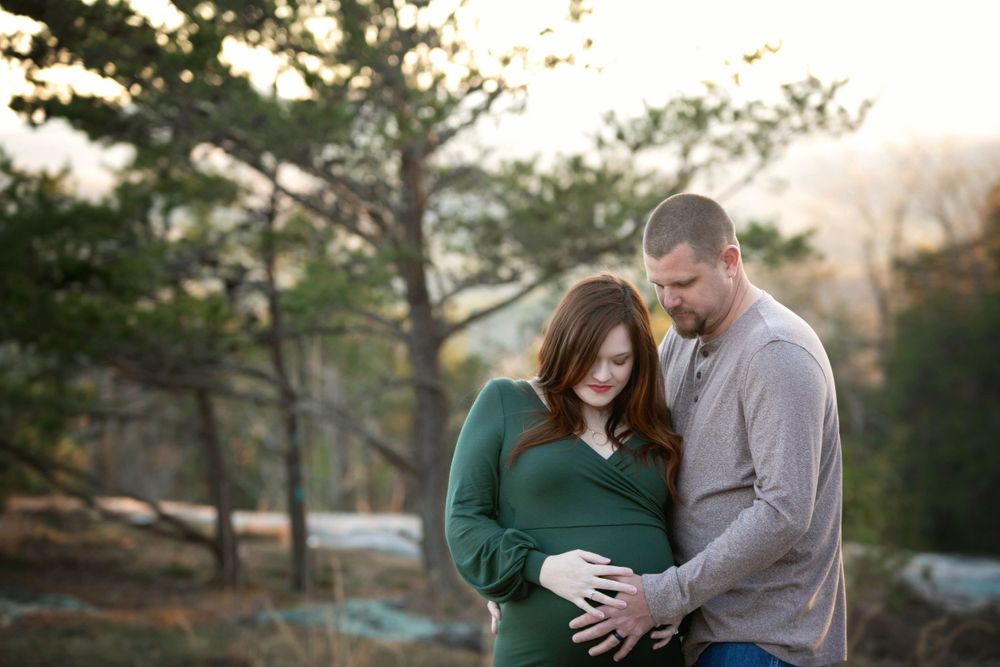 Bald Rock maternity session with parents holding the belly. Greenville, SC newborn photographer, Easley, SC Newborn photographer
