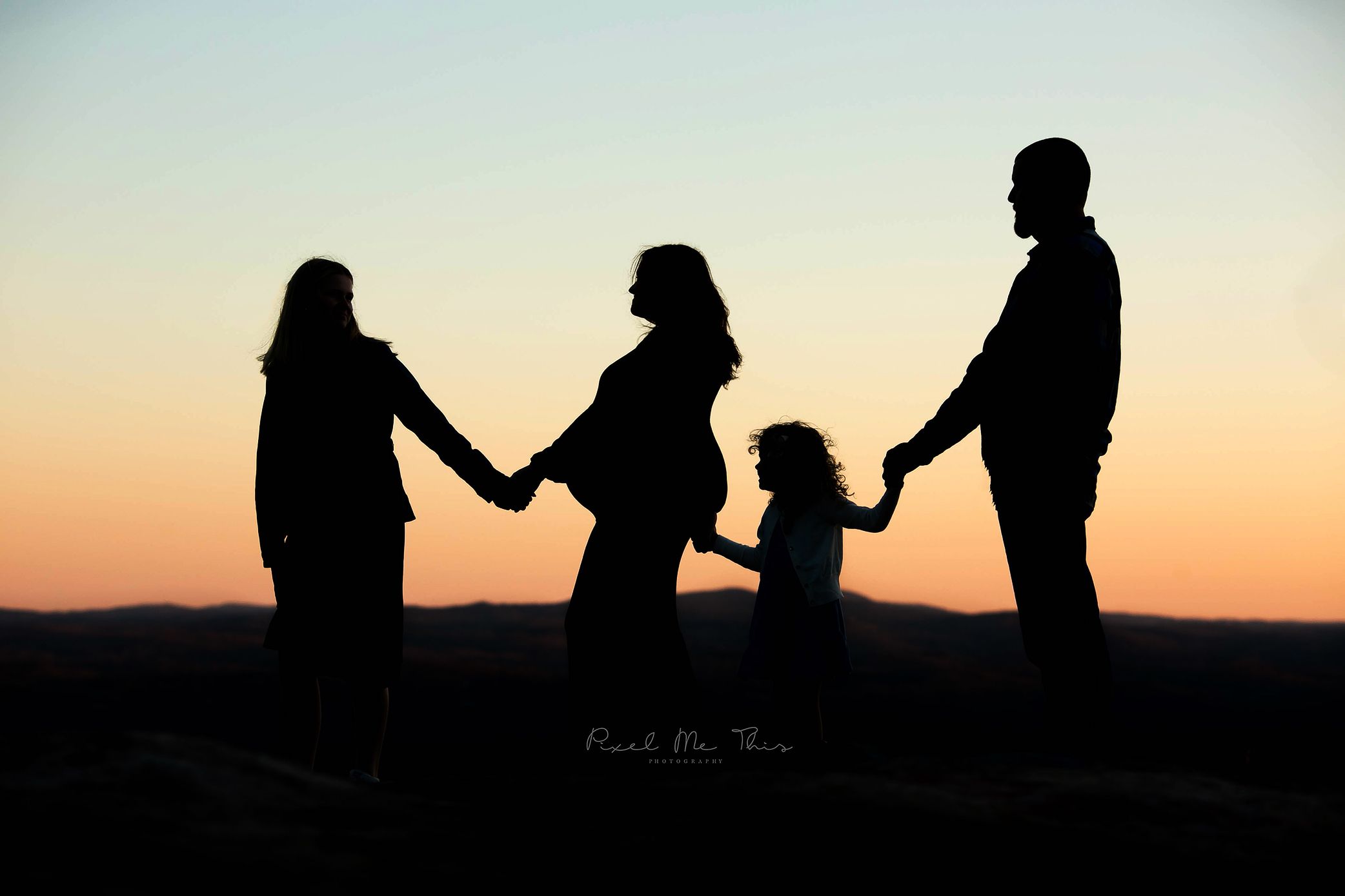 Silhouette of family on a mountain. Greenville, SC newborn photographer, Easley, SC Newborn photographer