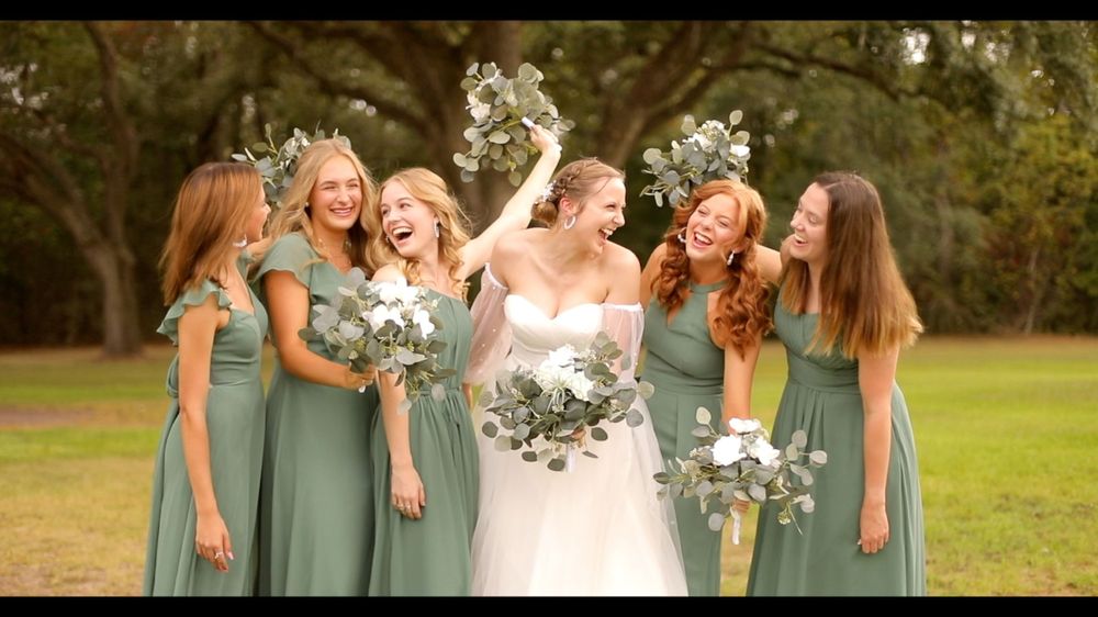 Bride and Bridesmaids Smiling and Laughing Outdoor Wedding Photo Green Bridesmaid Dresses