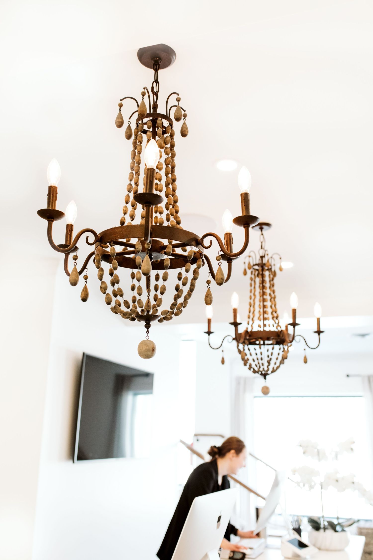 chandelier above reception table