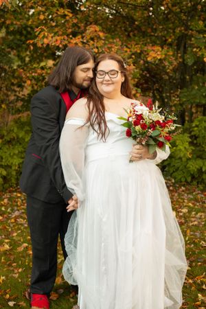 Husband and Wife in a cuddly pose at Lake City Township Hall