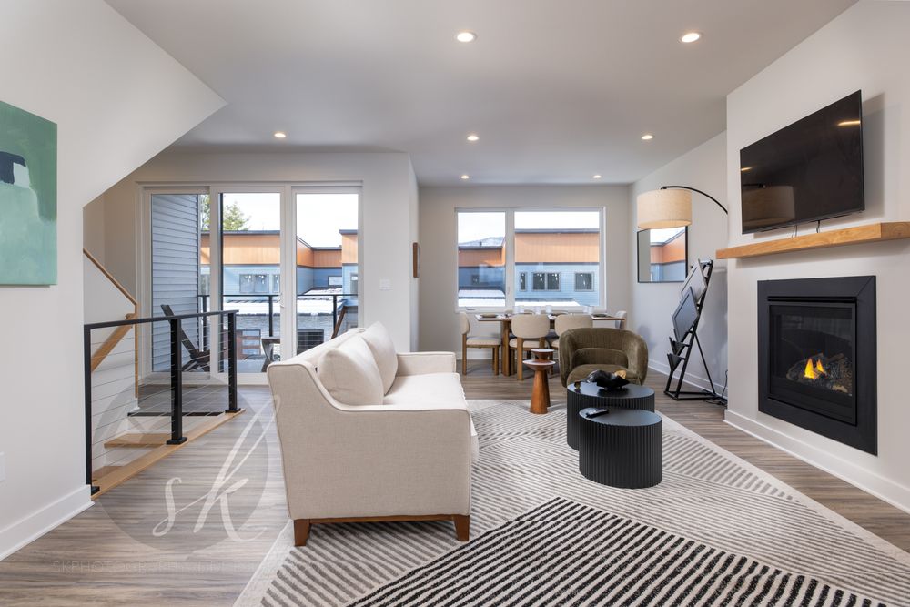 A photo of a modern living space professionally taken of a new construction Lake George town home.