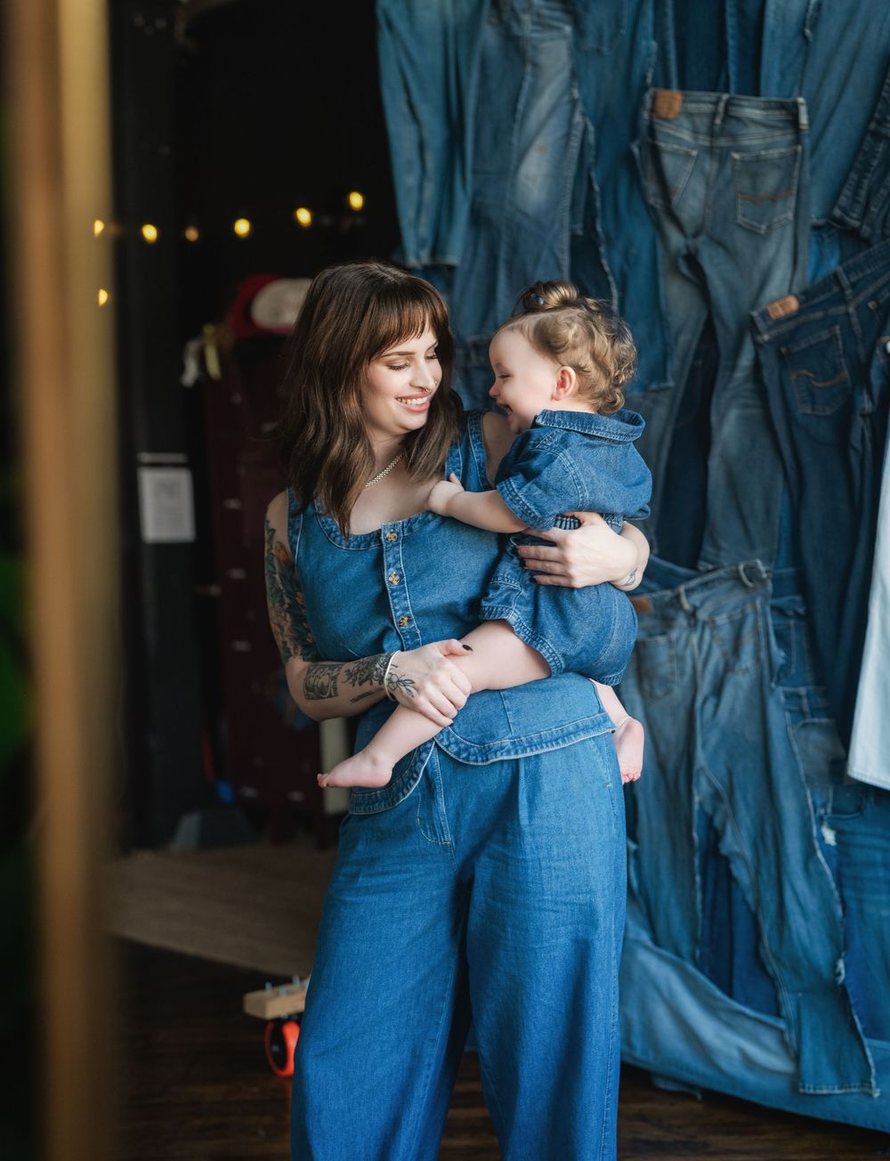 Mother and daughter in jean outfits for their mother and daughter photoshoot in Cincinnati Ohio