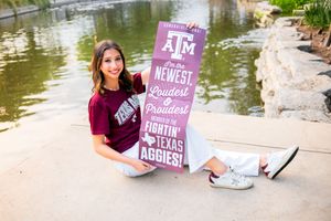 Bright San Antonio senior graduate posing for senior portraits at the Historical Pearl Brewery.