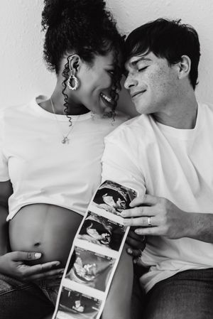 Pregnancy announcement photo shoot. In studio pregnancy announcement photo shoot in Colorado. Colorado maternity photographer