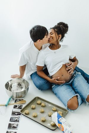 Pregnancy announcement photo shoot. In studio pregnancy announcement photo shoot in Colorado. Colorado maternity photographer