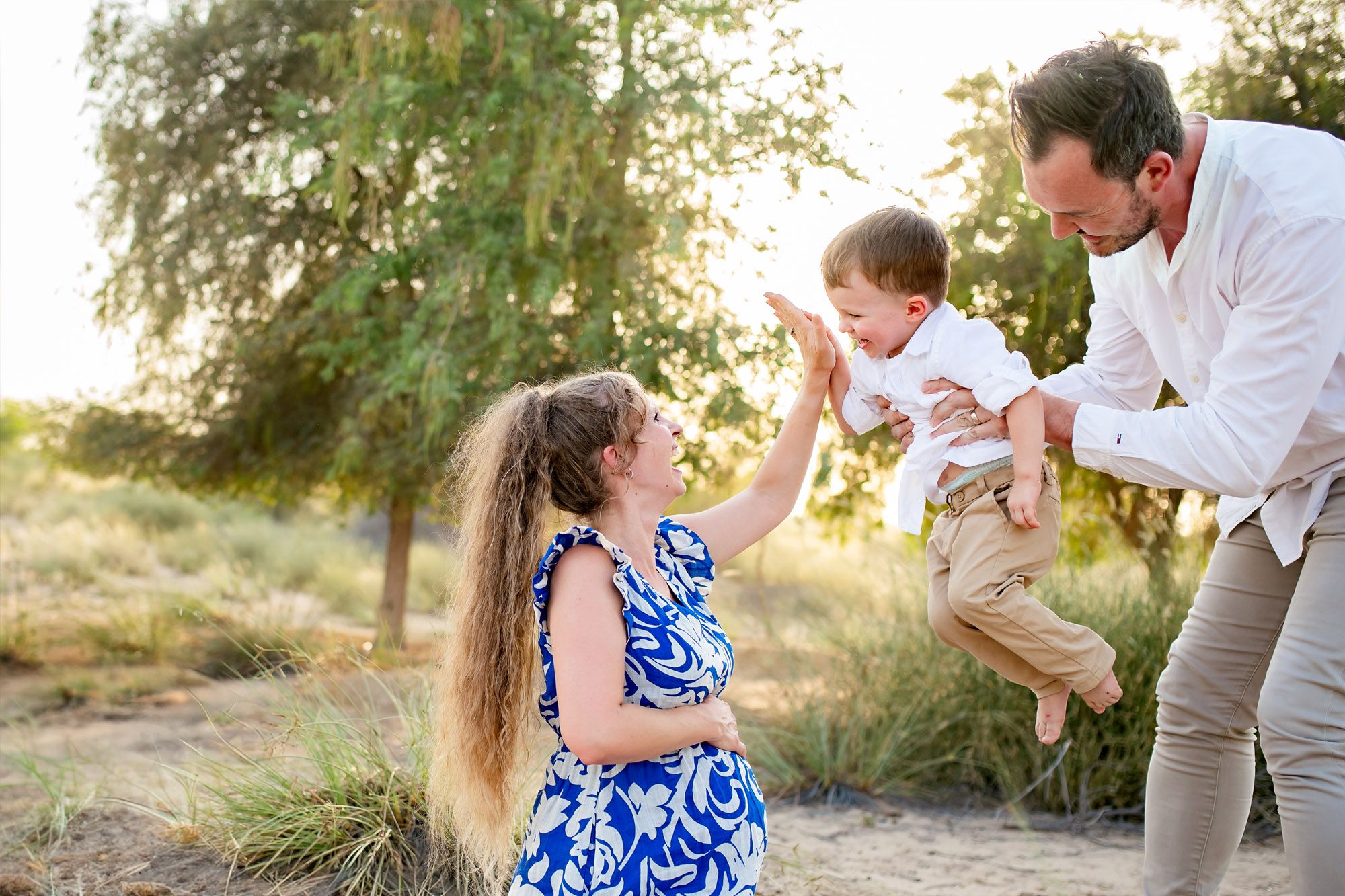 maternity photos outdoor greenery dubai