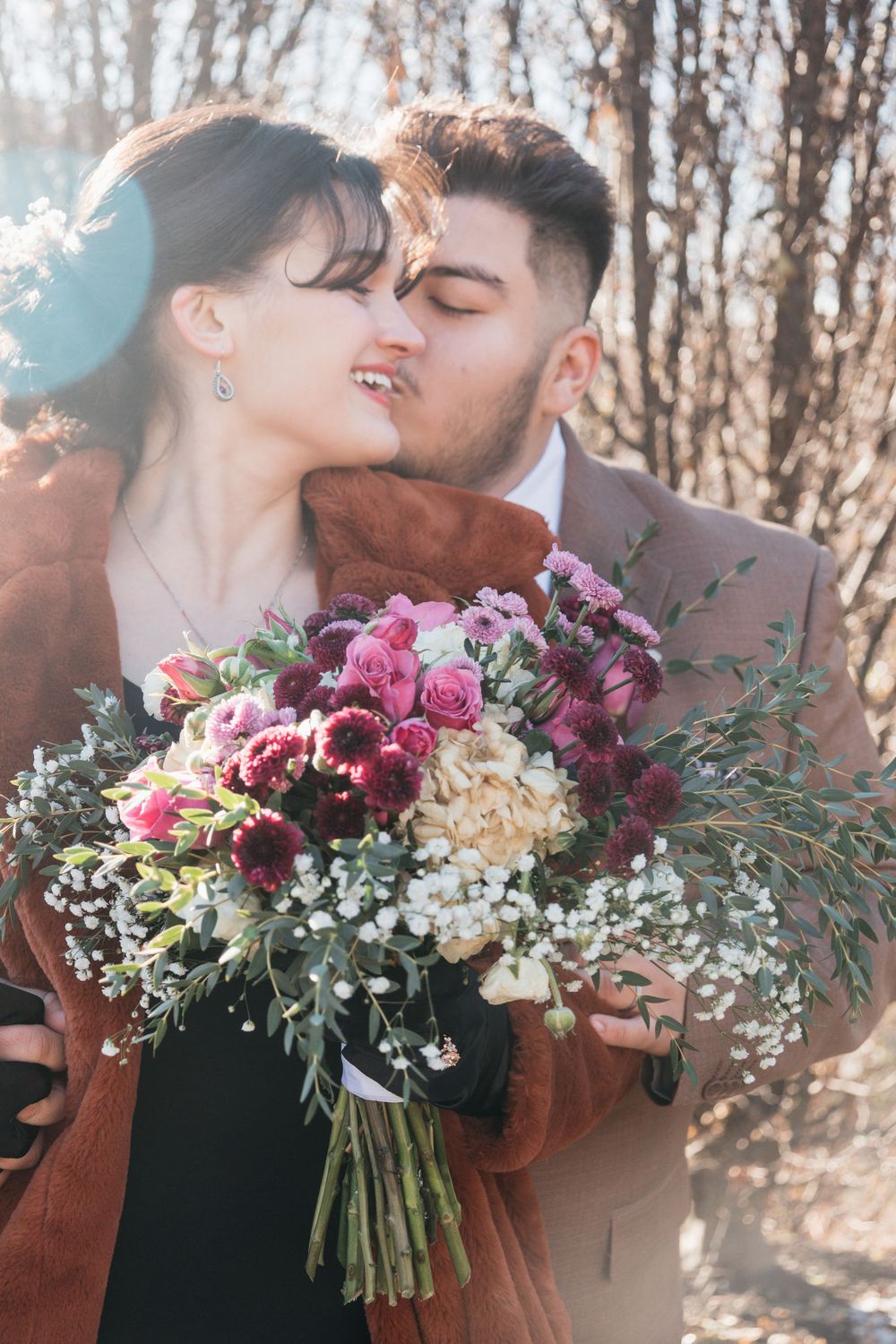 Cinematic emotional moment with bride and groom.