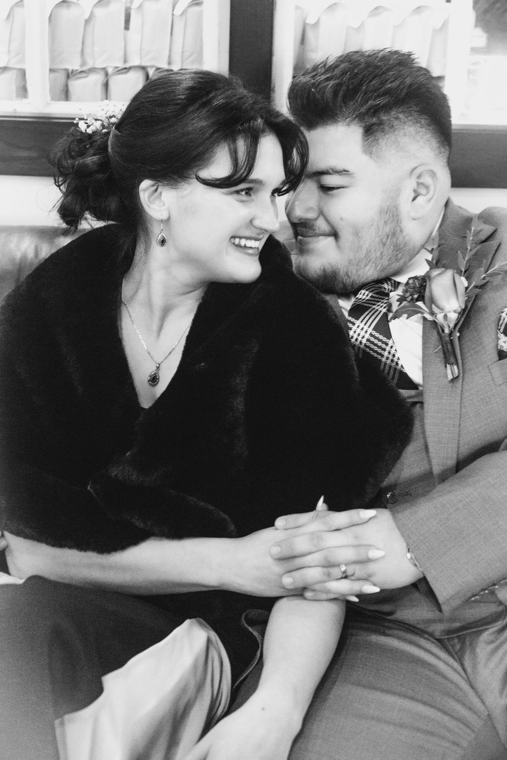 Couple portraits of bride and groom in coffee shop in Beacon NY.