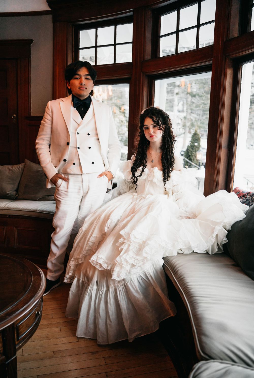 Elegant winter wedding portrait with bride and groom.