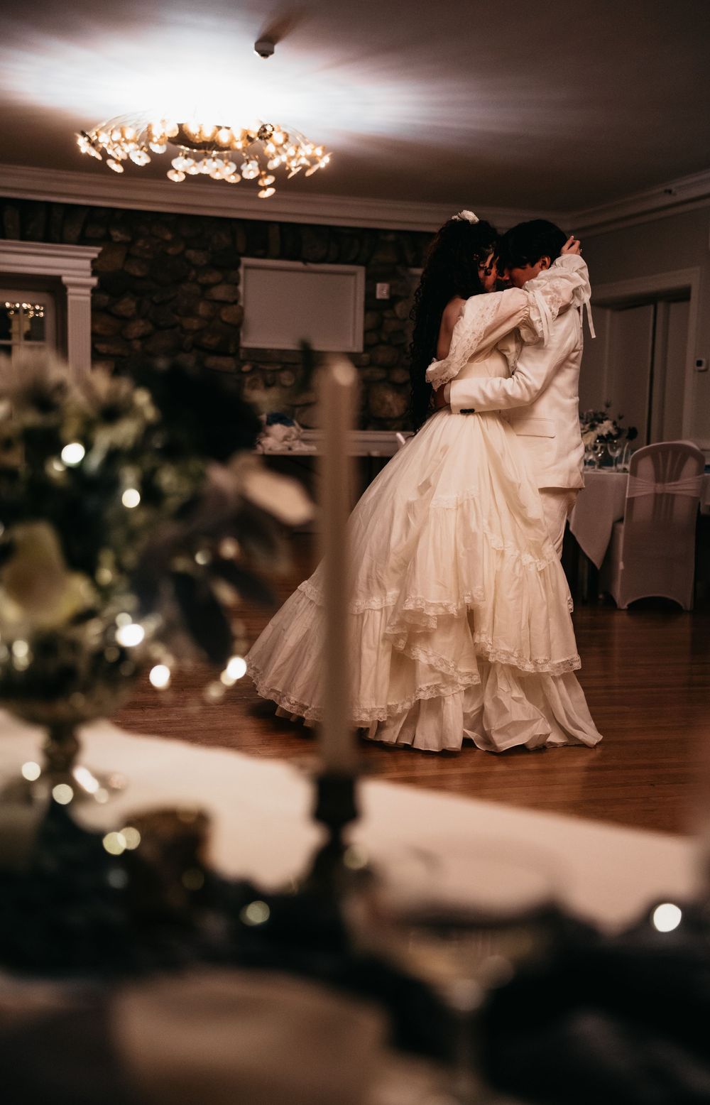Moody elegant moment as couple has their last dance.