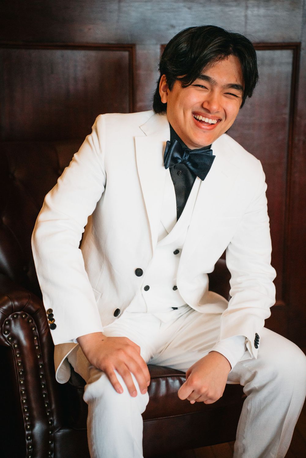 Groom getting ready portraits.