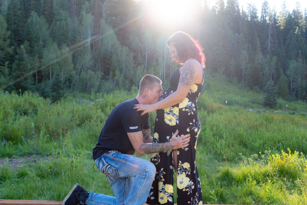 Engagement photoshoot sequence with mountain scenery and dramatic sunlight.