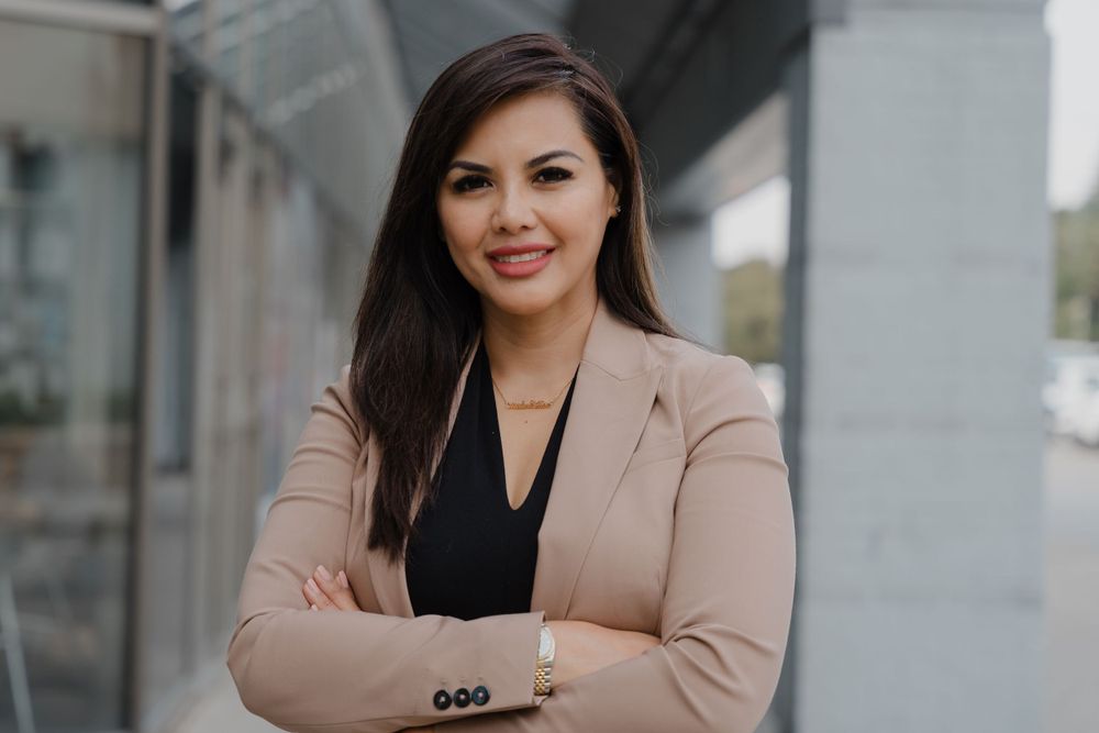 professional headshot of a female ceo with arms crossed
