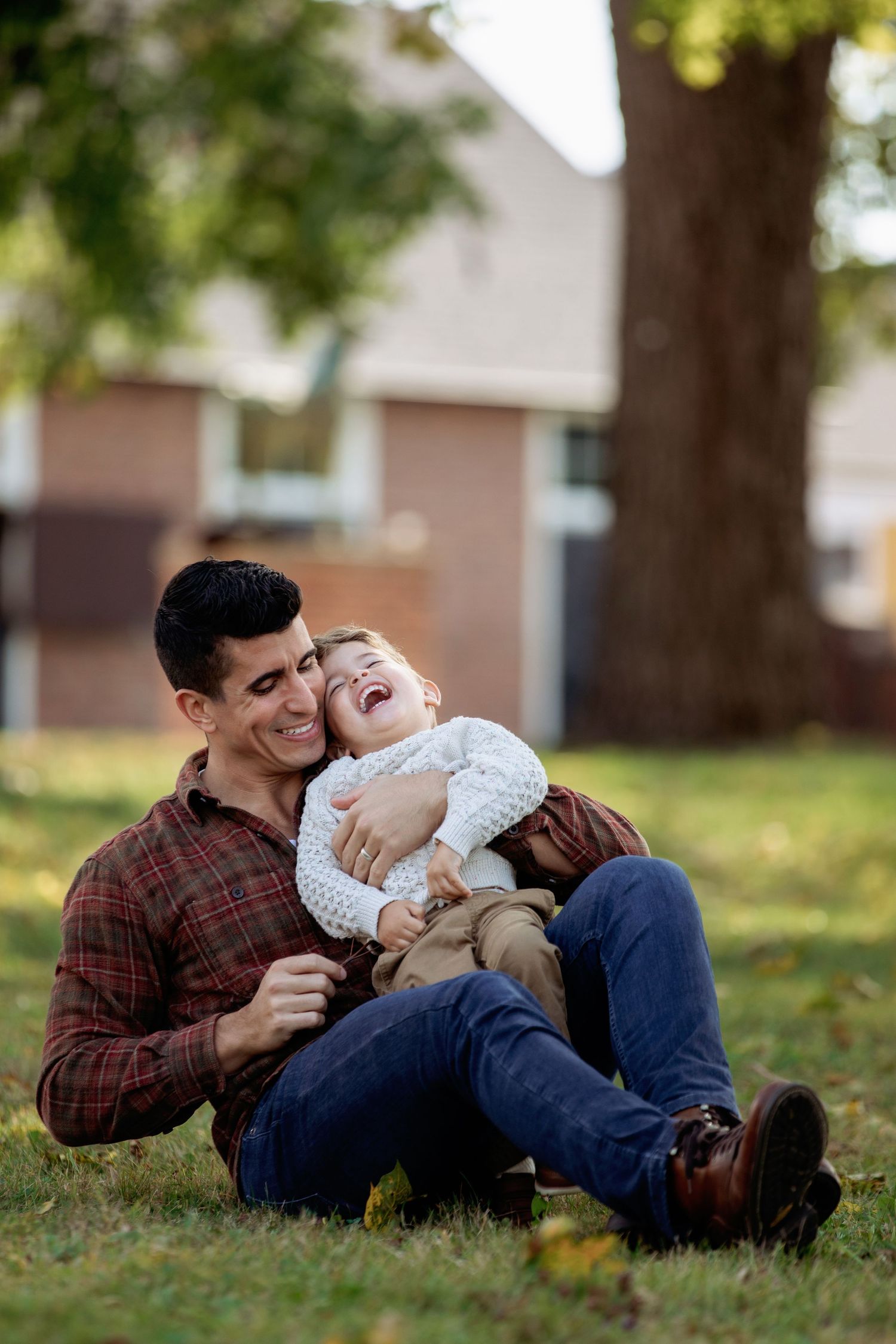 Candid moment captured on grass during autumn day.