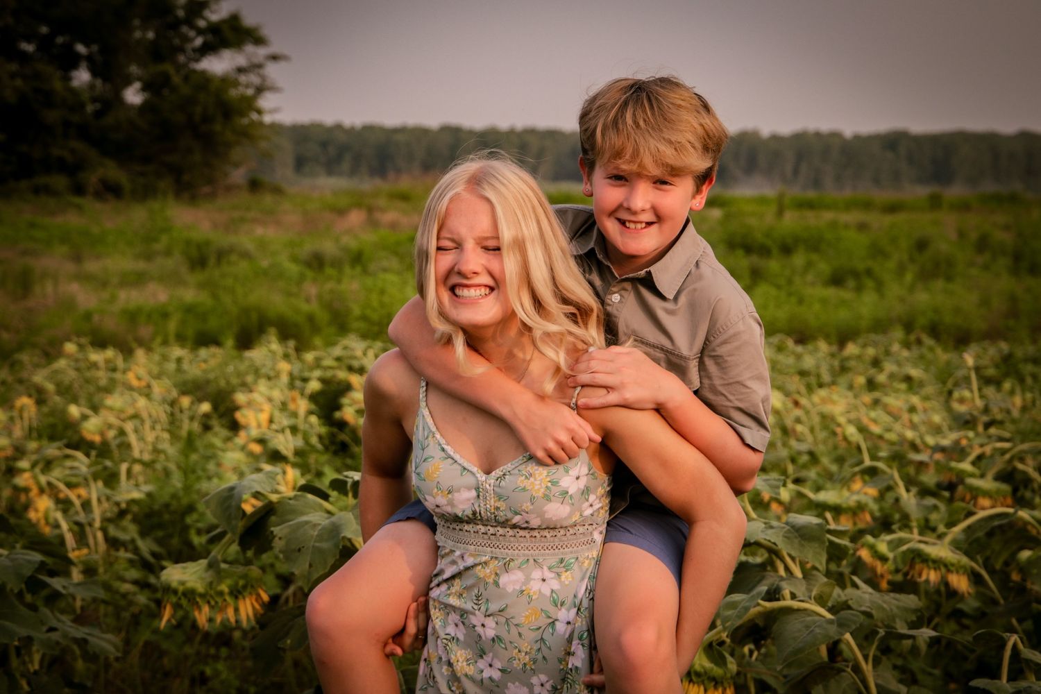 Brother and sister piggyback ride