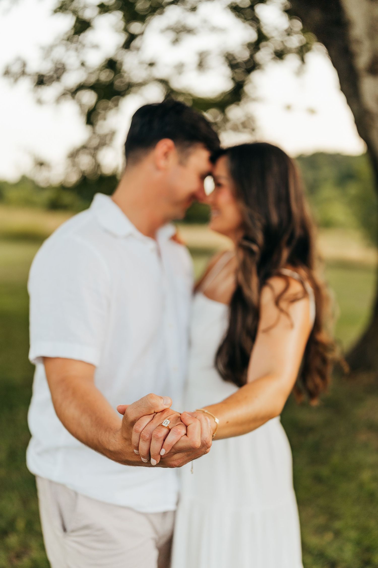 A romantic black and white portrait of a couple embracing intimately outdoors engagement photoshoot northern illinois photographer