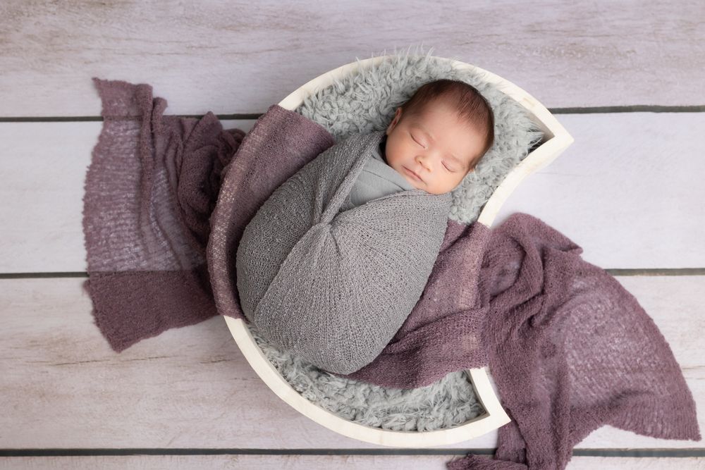 newborn photography with moon by Samantha Ann Photo studio swansboro professional newborn photos.