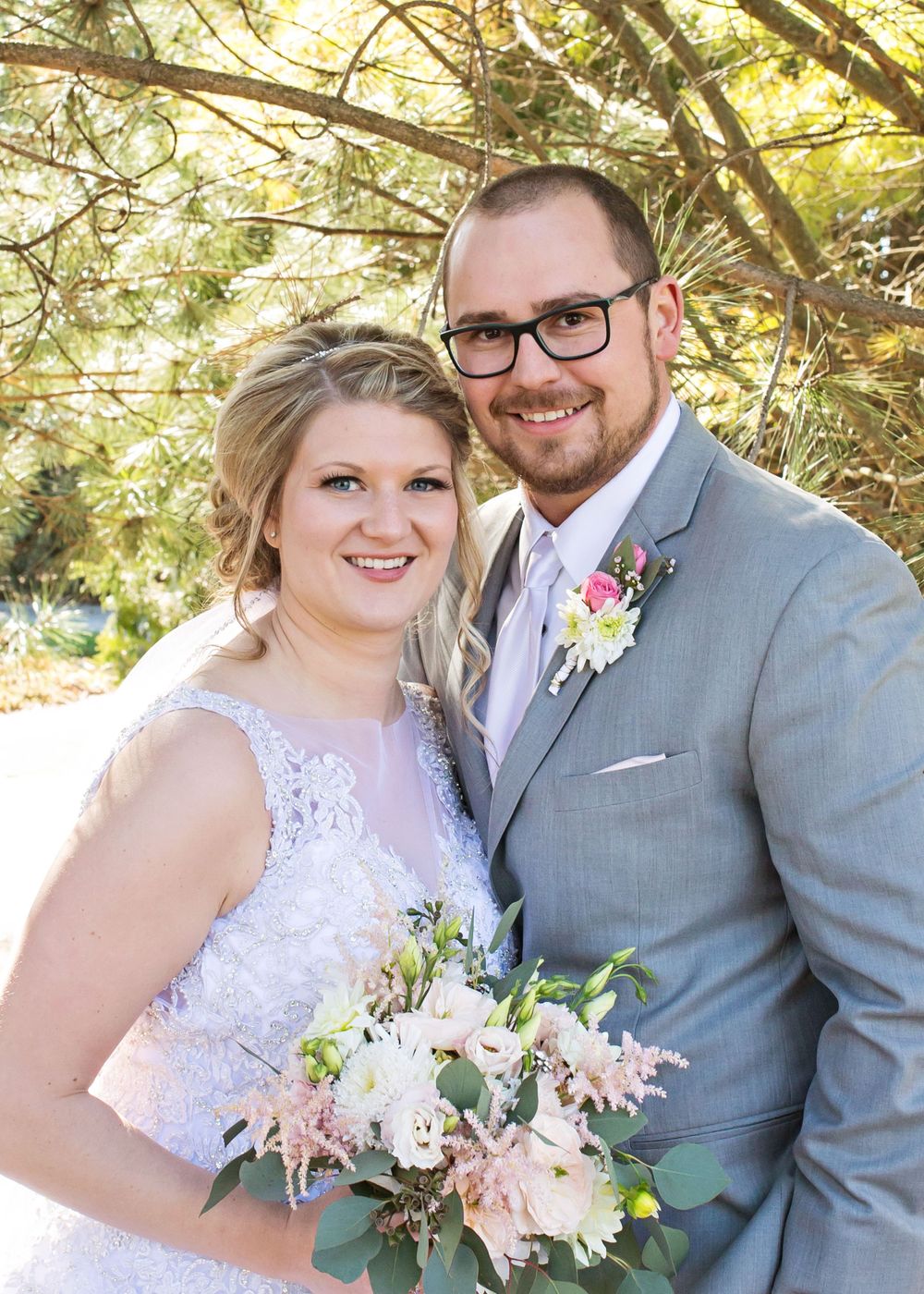 Bride and groom wedding portrait in Fond du Lac WI, captured outdoors with natural light, showcasing love, elegance, and timeless moments