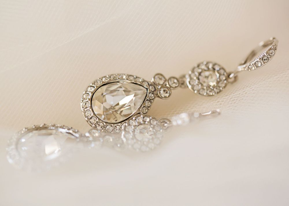 Bridal wedding dress, shoes, bouquet, rings, and jewelry captured during Appleton WI wedding, showcasing elegant, timeless details