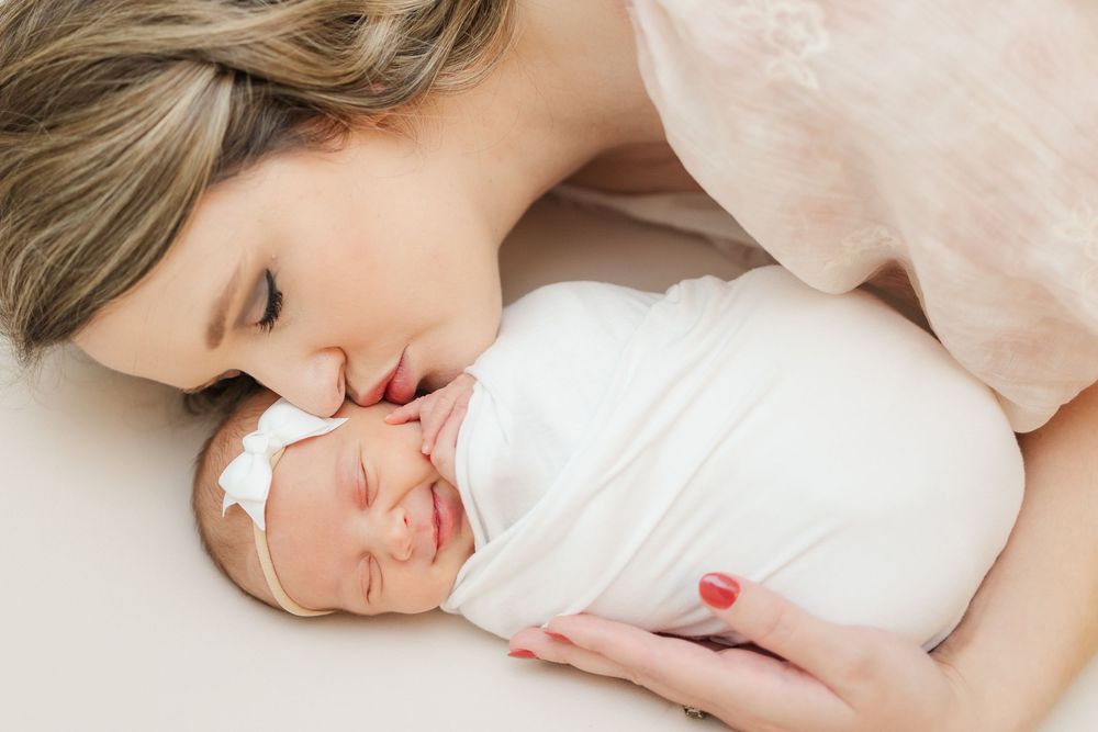 Newborn girl with mom