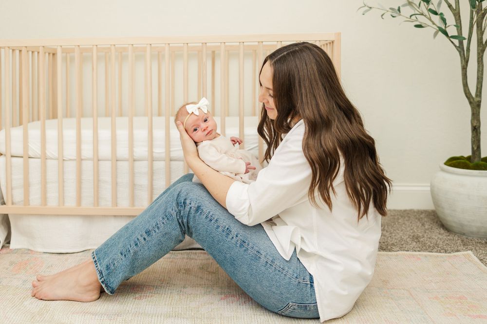 Newborn girl with mom