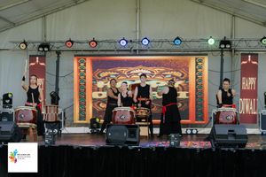 A series of wide stage performance photos showing theatrical scenes with actors and set pieces on various stages.