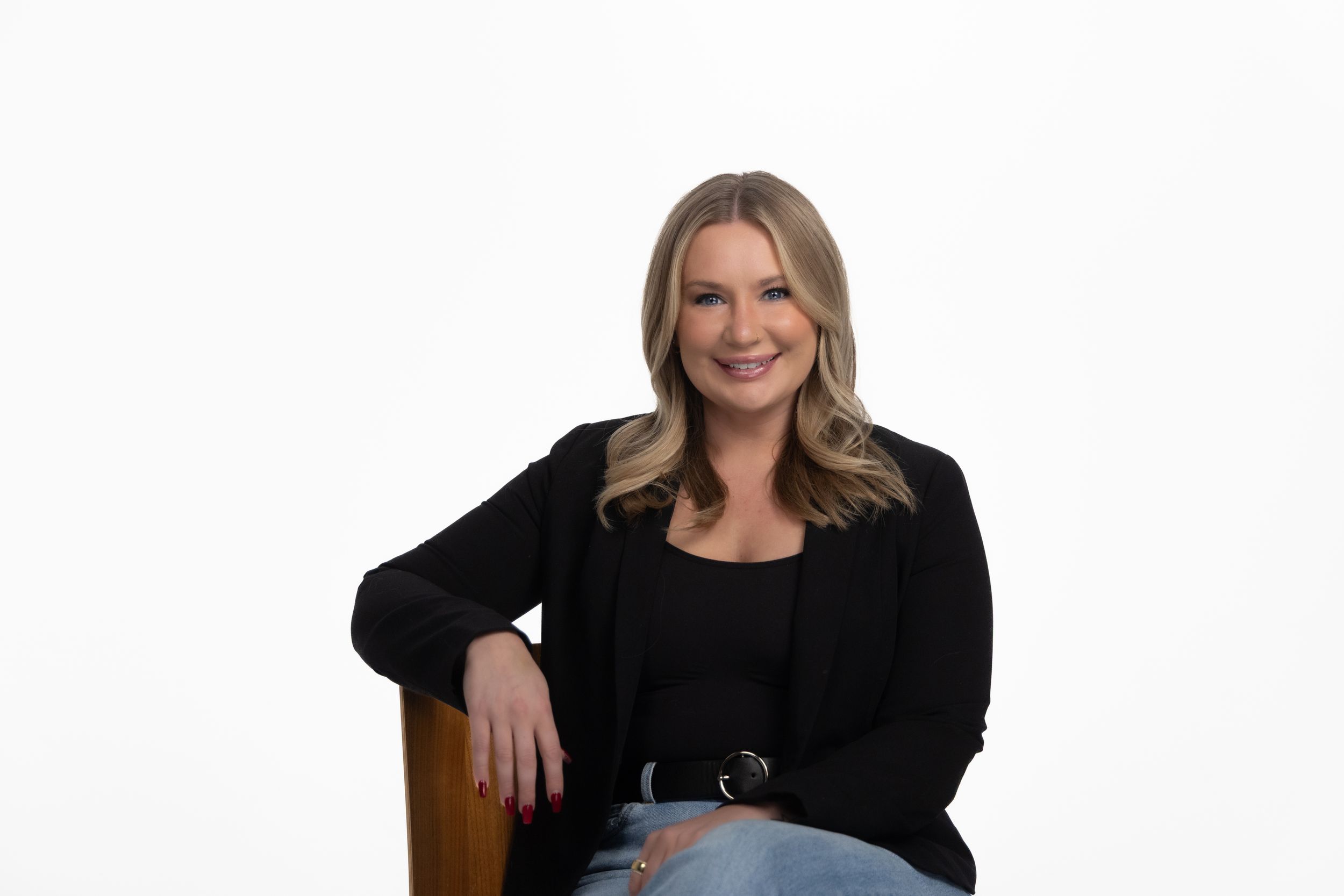 Professional headshots of a woman in business attire against white background.