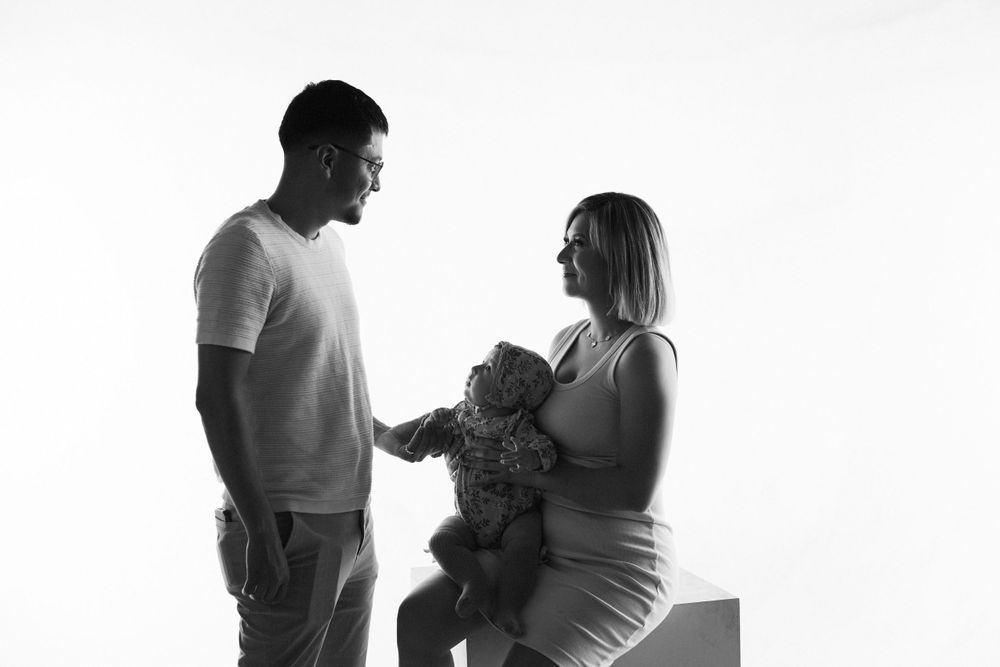 Black and white series of intimate family portraits.