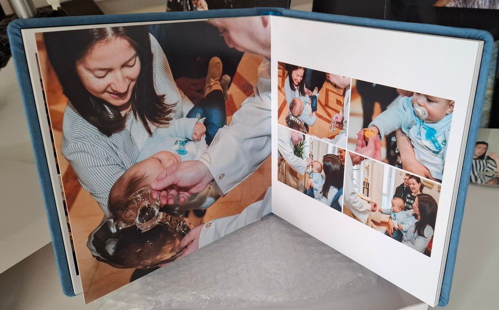 A series of connected photos showing hands assembling a photo album or memory book together.