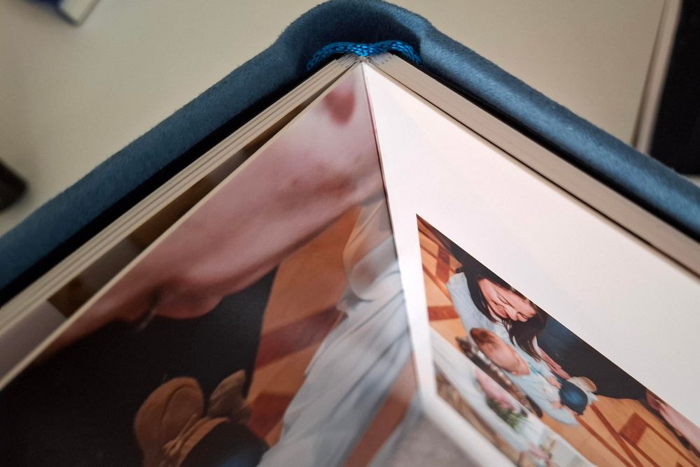 Multiple similarly composed photos displayed in digital photo frames on a table.