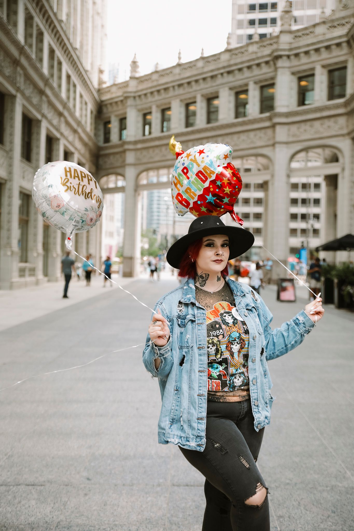 a woman posing for her birthday photoshoot in Chicago , IL