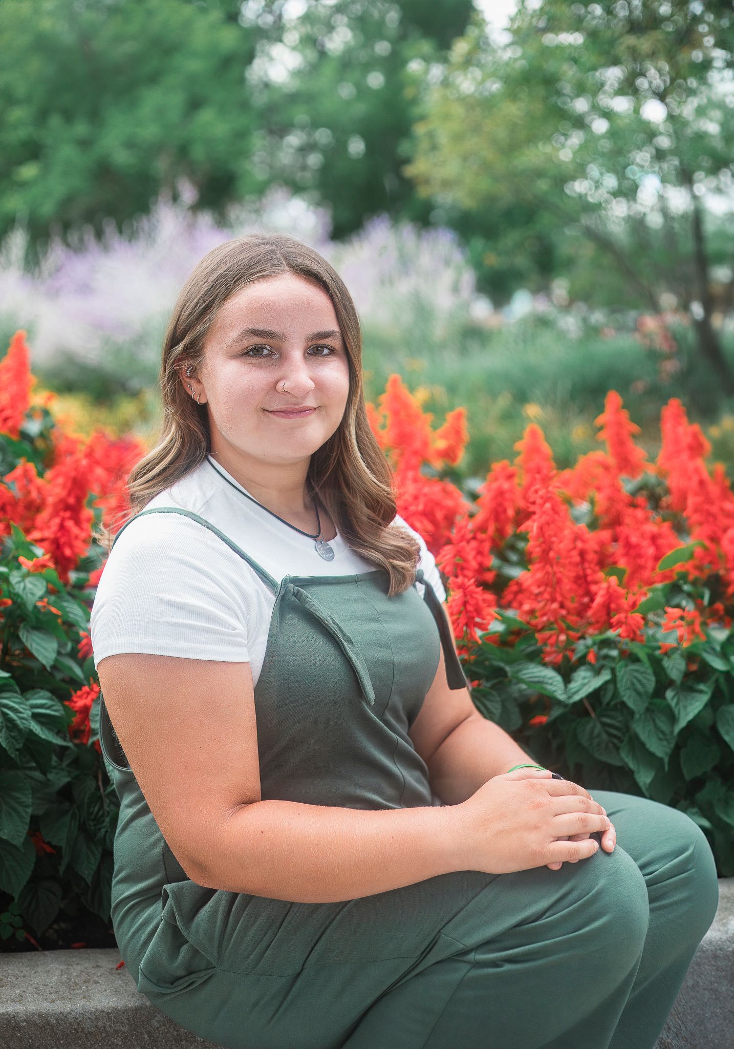 girl posing in flower garden. senior photoshoot in schaumburg, IL