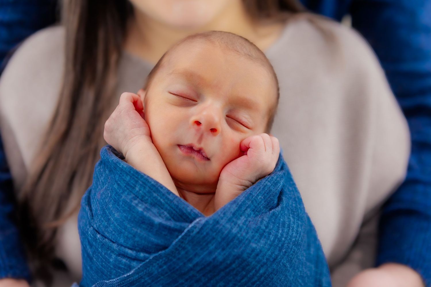 picture perfect baby sleeping with gauze wrap draped over tiny toes